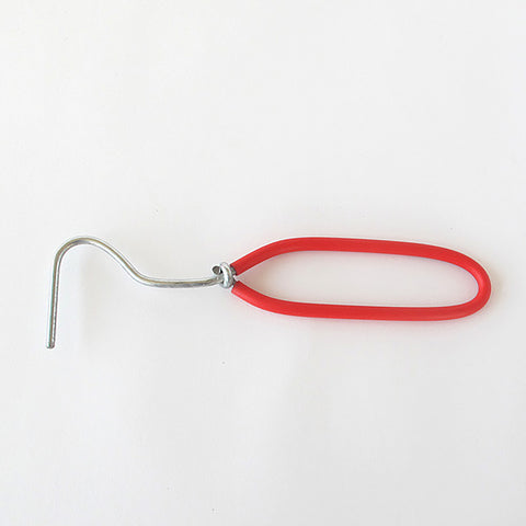 Wonder weeder with red handle on white background